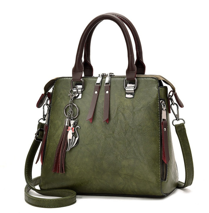 Sac à main structuré – Charms fantaisie et élégance urbaine