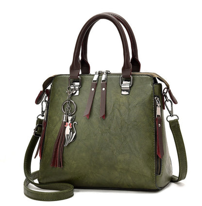 Sac à main structuré – Charms fantaisie et élégance urbaine