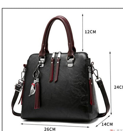 Sac à main structuré – Charms fantaisie et élégance urbaine