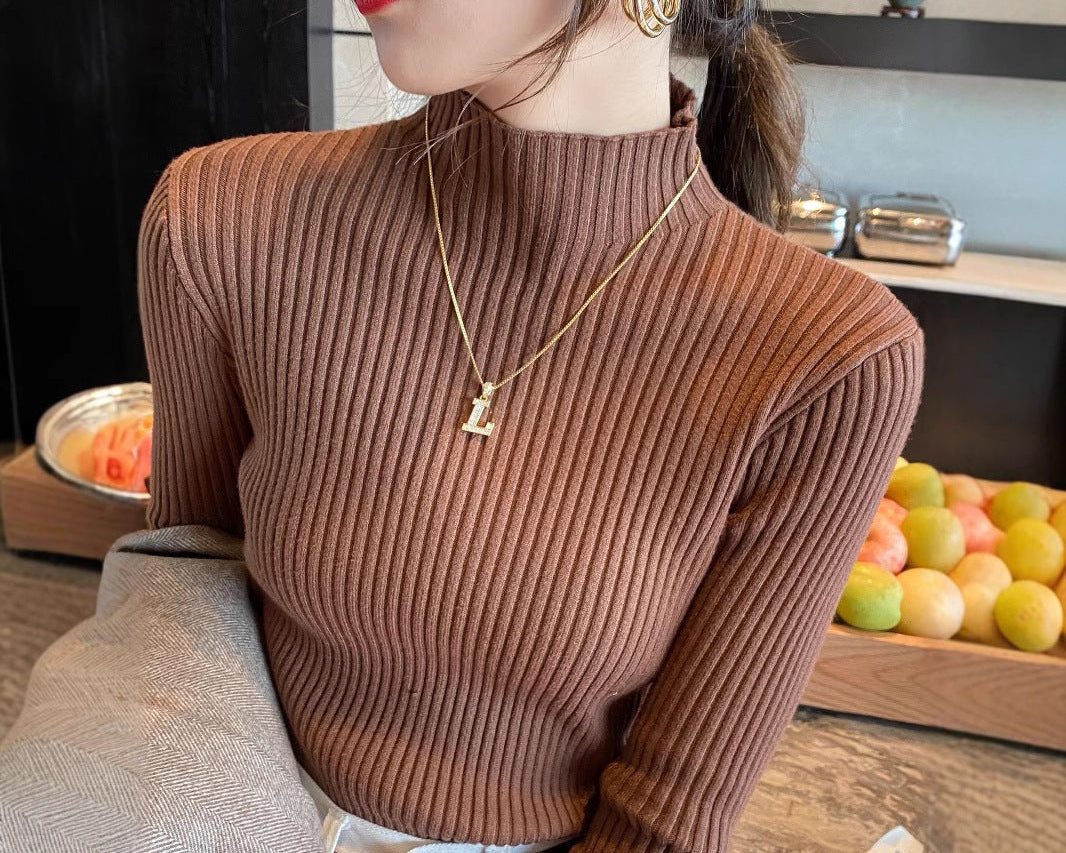 Pull côtelé à col montant – Coupe ajustée et allure chic