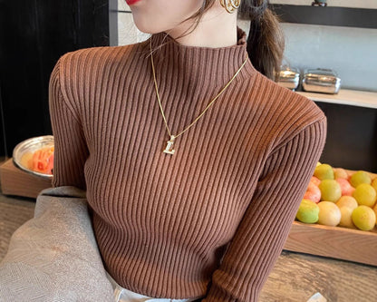 Pull côtelé à col montant – Coupe ajustée et allure chic