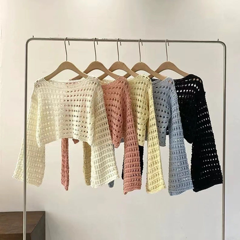 Pull court en maille ajourée tendance