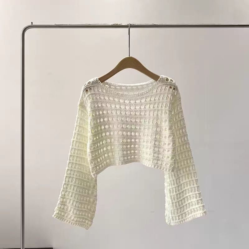 Pull court en maille ajourée tendance
