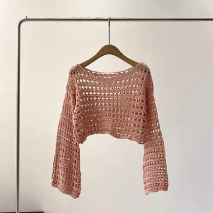 Pull court en maille ajourée tendance