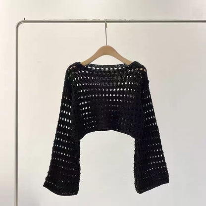 Pull court en maille ajourée tendance