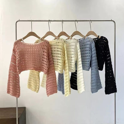 Pull court en maille ajourée tendance